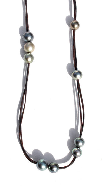 Fourteen Tahitian Baroque Pearls On Hand Rolled Triple Strand Leather Necklace